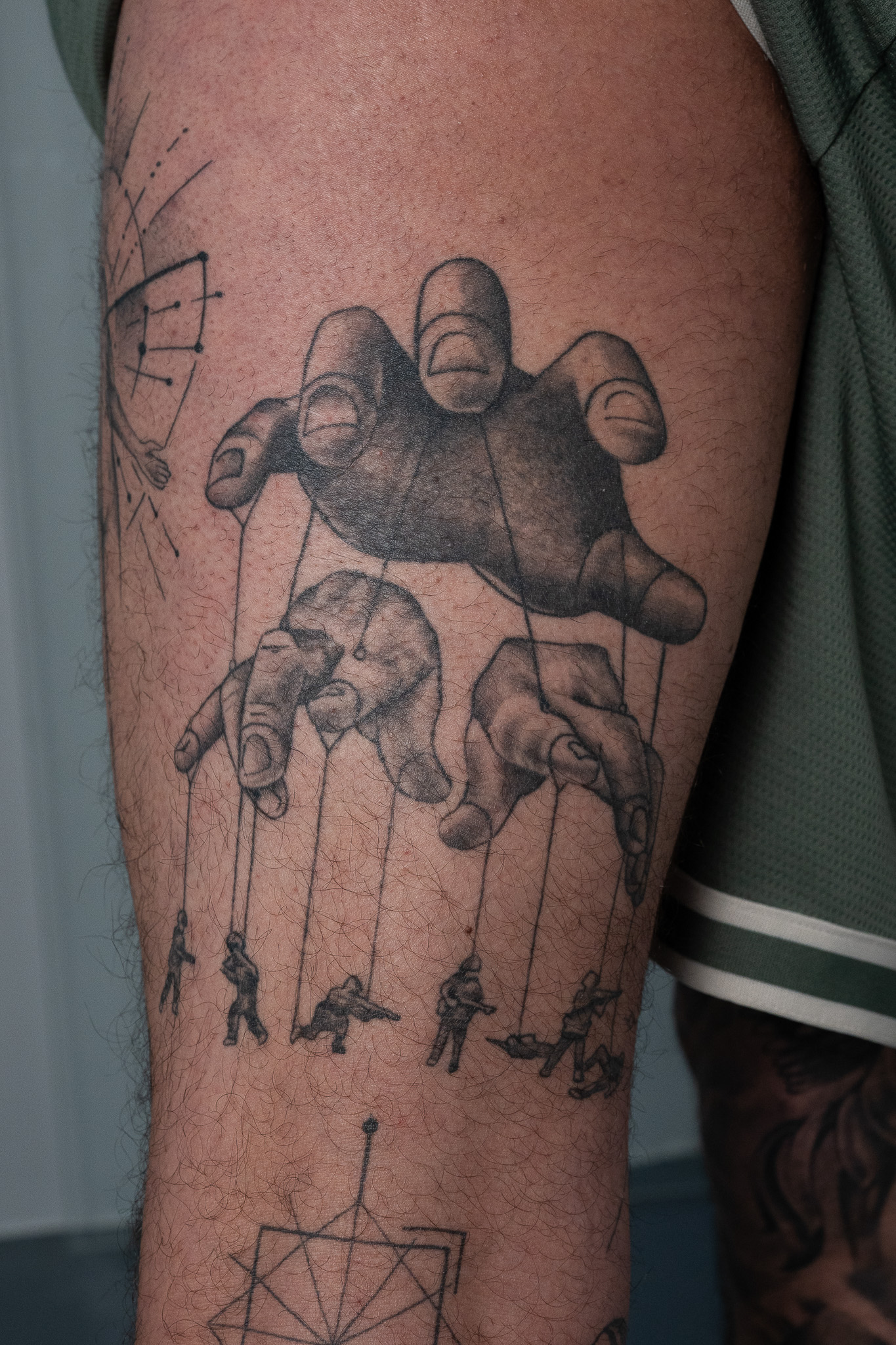 Tattoo - Marionettenspeler handen