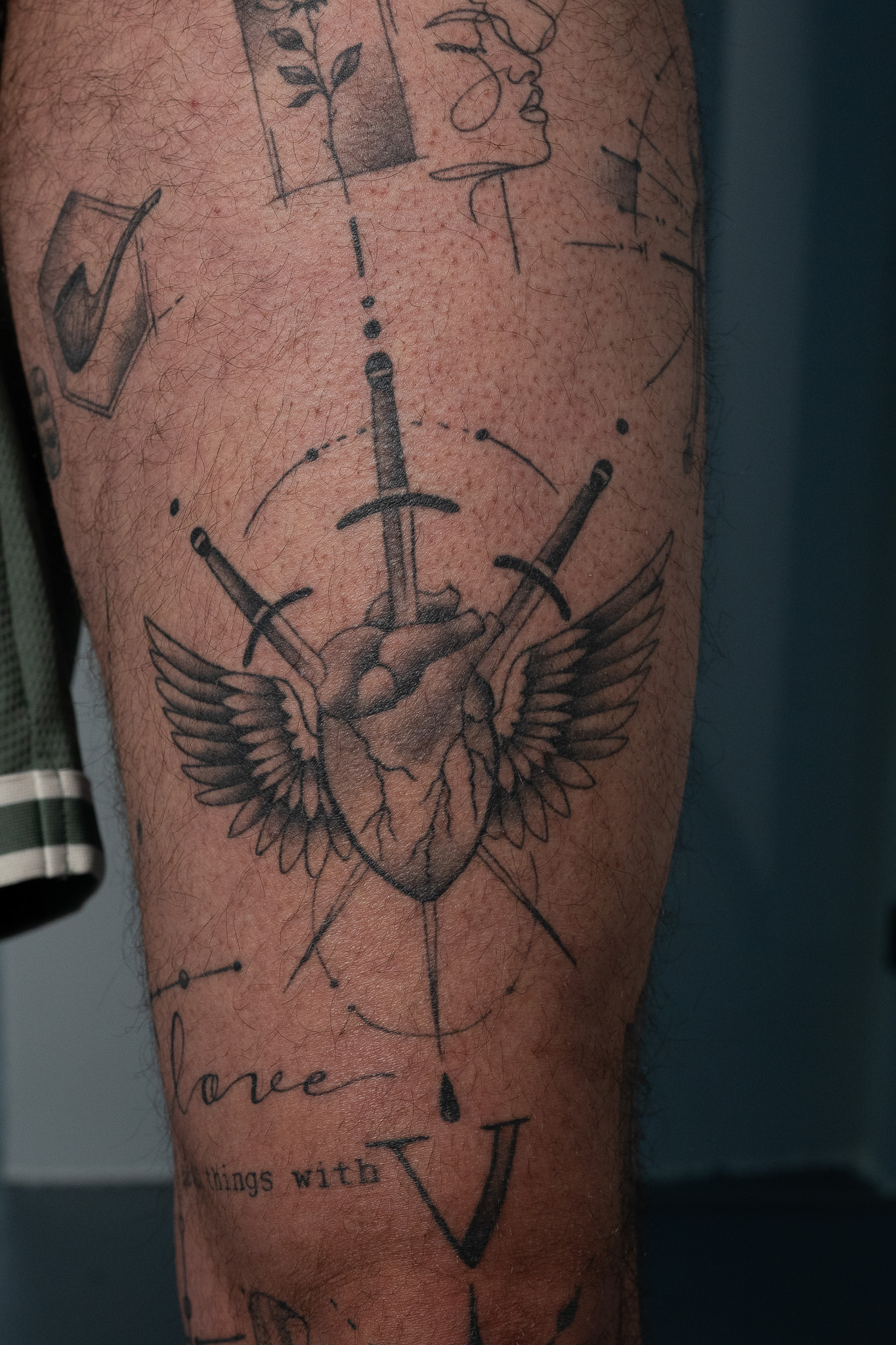 Tattoo - Gevleugeld hart met zwaarden